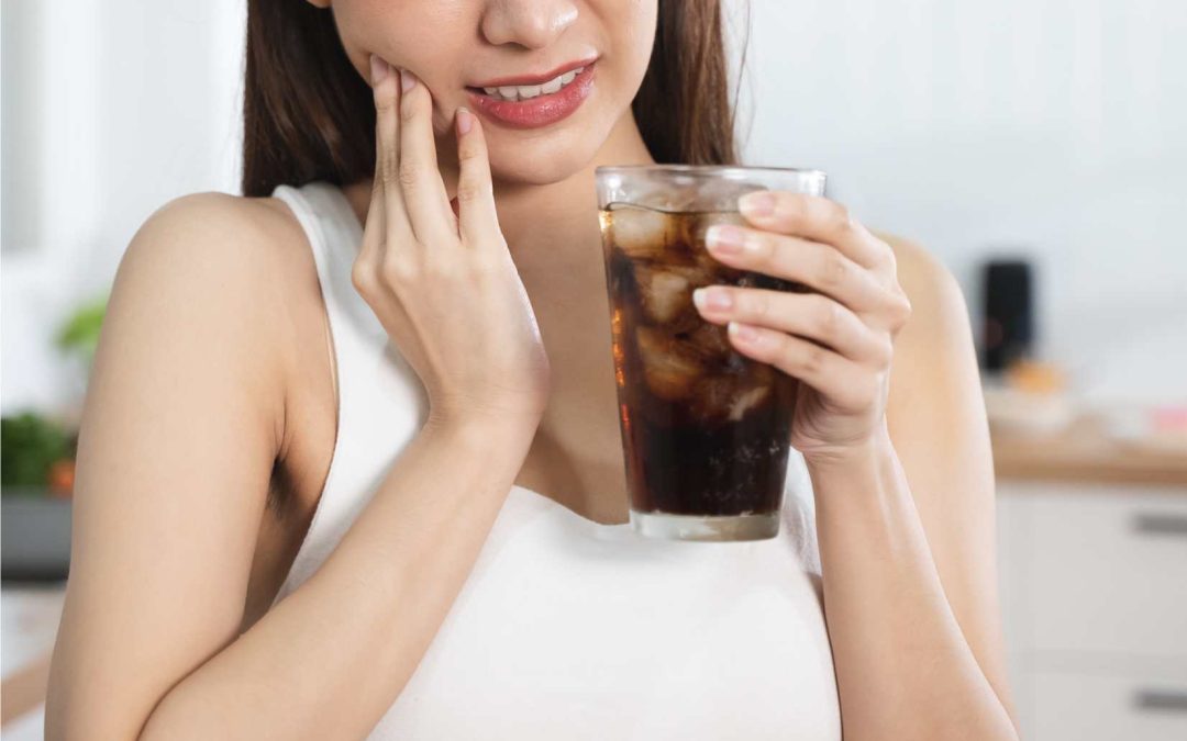 Tooth Sensitivity: Why Your Teeth Hurt & What to Do About It