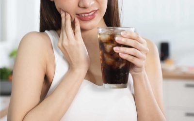 Tooth Sensitivity: Why Your Teeth Hurt & What to Do About It